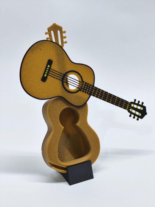 porta púas de guitarra con forma de guitarra